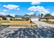 Inviting single-story home featuring a landscaped front yard, fresh paint, and an attached two-car garage at 2811 Citron Dr, Longwood, FL 32779