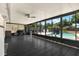 Enclosed patio boasts floor-to-ceiling windows, pool view and outdoor kitchen area at 2811 Citron Dr, Longwood, FL 32779