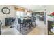 Eat-in kitchen with adjacent bar offers backyard view through sliding glass doors at 2815 Shelburne Way, St Cloud, FL 34772