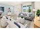 Bright and open living room, perfect for entertaining guests and relaxing at 2831 Camellia Flower St, Apopka, FL 32703