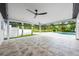 Covered outdoor patio with ceiling fans, recessed lighting, and a view of the pool and backyard at 3011 Temple Trl, Winter Park, FL 32789