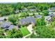 Gorgeous aerial view of a single Gathering home featuring a circular driveway and mature landscaping at 370 Brushwood Ln, Winter Springs, FL 32708