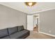Cozy bedroom offering a comfortable sofa for relaxing and reading at 370 Brushwood Ln, Winter Springs, FL 32708