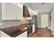 Bright kitchen showcasing modern appliances, ample counter space, and stylish cabinetry at 370 Brushwood Ln, Winter Springs, FL 32708