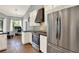 Bright kitchen with stainless steel appliances and a charming built-in breakfast nook at 370 Brushwood Ln, Winter Springs, FL 32708