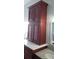 Bathroom featuring a vanity with marble countertop and elegant cabinetry at 3700 Plantation Blvd, Leesburg, FL 34748