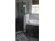 Bathroom with tub, standup shower and large tile floor at 3700 Plantation Blvd, Leesburg, FL 34748