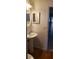 Bathroom featuring a pedestal sink, neutral paint and tile flooring at 3700 Plantation Blvd, Leesburg, FL 34748