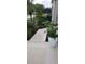 Well-maintained front yard with lush landscaping and decorative planters, adding to the curb appeal at 3700 Plantation Blvd, Leesburg, FL 34748