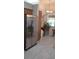 Bright kitchen with stainless steel refrigerator, ample counter space, and natural light at 3700 Plantation Blvd, Leesburg, FL 34748