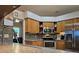 Well-equipped kitchen with stainless steel appliances and eat-in nook visible at 3700 Plantation Blvd, Leesburg, FL 34748