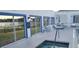 This image shows a community pool with a lake view, perfect for recreation and relaxation at 3700 Plantation Blvd, Leesburg, FL 34748