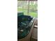 An in-ground spa with many jets is encased in the frame of a window overlooking the outdoors at 3700 Plantation Blvd, Leesburg, FL 34748
