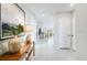 Hallway with decorative furniture and lots of natural light at 4760 Yellow Elder Way, Kissimmee, FL 34758