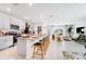 Open-concept kitchen with a large island and breakfast bar, great for entertaining guests at 4760 Yellow Elder Way, Kissimmee, FL 34758