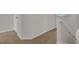 Carpeted staircase with white railing at 5214 Dragonfly Dr, Wildwood, FL 34785