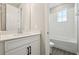 Bathroom featuring vanity, mirror, and view into water closet at 5242 Citrus Leaf, Winter Garden, FL 34787