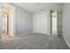 Bedroom with carpet, closet, en-suite, and fresh paint in neutral colors at 5242 Citrus Leaf, Winter Garden, FL 34787