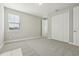 Bright carpeted bedroom with large window and closet at 5242 Citrus Leaf, Winter Garden, FL 34787