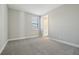 Carpeted bedroom with natural light and en-suite bathroom, freshly painted in neutral at 5242 Citrus Leaf, Winter Garden, FL 34787