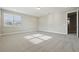 Spacious bedroom with neutral carpet, light-filled window, and fresh paint at 5242 Citrus Leaf, Winter Garden, FL 34787