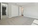 Bedroom featuring closet and en-suite with a view of the hallway at 5242 Citrus Leaf, Winter Garden, FL 34787