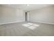 Bright bedroom features recessed lighting, neutral paint and carpet, and open doorway at 5242 Citrus Leaf, Winter Garden, FL 34787