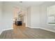 An open-concept dining room, showing seamless flow to the kitchen, creating an inviting living space at 5242 Citrus Leaf, Winter Garden, FL 34787