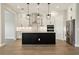Beautiful kitchen features a large center island, white cabinetry, and stainless steel appliances at 5242 Citrus Leaf, Winter Garden, FL 34787