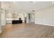 The combined living room and kitchen provides an open floor plan and tile floors throughout at 5242 Citrus Leaf, Winter Garden, FL 34787