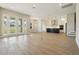 Open-concept living space seamlessly connects the living room to the kitchen at 5242 Citrus Leaf, Winter Garden, FL 34787