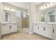 Modern main bathroom with double sinks, a glass-enclosed shower, and tile flooring at 5242 Citrus Leaf, Winter Garden, FL 34787