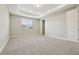 Spacious main bedroom features neutral carpet, a tray ceiling, and a walk-in closet at 5242 Citrus Leaf, Winter Garden, FL 34787