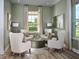 Cozy sitting room featuring four plush chairs, soft colors and a large sunny window at 5242 Citrus Leaf, Winter Garden, FL 34787