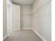 Walk-in closet with carpet and white wire shelving for ample storage at 5242 Citrus Leaf, Winter Garden, FL 34787
