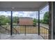 A private covered porch area offering neighborhood views at 5325 Curry Ford Rd # G202, Orlando, FL 32812