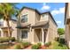 Charming two-story home with manicured landscaping and a welcoming front entrance at 7349 Ella Ln, Windermere, FL 34786