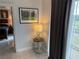 Relaxing bedroom entrance featuring tiled floor, a lamp and view of the main bedroom at 7518 Seven Eagles Way # 201, Reunion, FL 34747