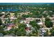 Desirable home location nestled among lush greenery in a neighborhood with a scenic lake view at 7703 Pine Vista Ct, Orlando, FL 32819