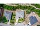 A bird's-eye view of the home showcasing its well-defined property lines and surrounding greenery at 825 White Birch Ct, Orange City, FL 32763