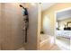 Bathroom with tiled shower, separate tub, and neutral decor at 825 White Birch Ct, Orange City, FL 32763
