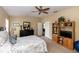 Spacious main bedroom with a view of the en-suite bathroom at 825 White Birch Ct, Orange City, FL 32763
