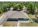 Beautiful house, showcasing its roof and landscape in an expansive lot at 8660 Sw 137Th Ct, Dunnellon, FL 34432