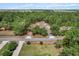 Expansive property featuring a charming home nestled among lush green trees at 8660 Sw 137Th Ct, Dunnellon, FL 34432