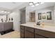 Bathroom features a double vanity and walk-in shower at 8660 Sw 137Th Ct, Dunnellon, FL 34432