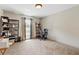 Neutral bedroom with large window and minimal furnishings at 8660 Sw 137Th Ct, Dunnellon, FL 34432