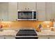 A modern kitchen with countertops and appliances, offering a contemporary cooking space at 8660 Sw 137Th Ct, Dunnellon, FL 34432
