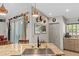 A functional kitchen showcasing a sink and countertop, modern hardware and under cabinet lighting at 8660 Sw 137Th Ct, Dunnellon, FL 34432