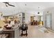 Open-concept living space featuring an eat-in kitchen, living room, and dining room with a modern design at 8660 Sw 137Th Ct, Dunnellon, FL 34432