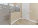 Stylish bathroom featuring a glass-enclosed shower with neutral-toned tile, offering a modern and refreshing bathing experience at 8679 Laureate Blvd, Orlando, FL 32827
